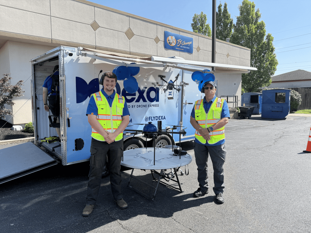 Dexa Drone Operators Loading In Front Of Trailer